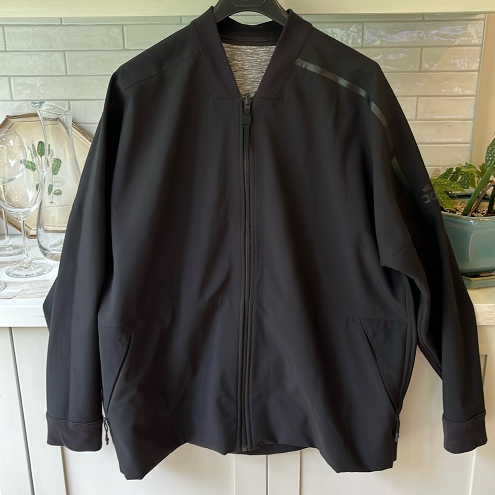 Mens Adidas reversible black/grey performance jacket.